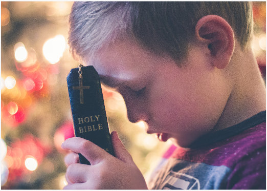 A young boy with the Bible